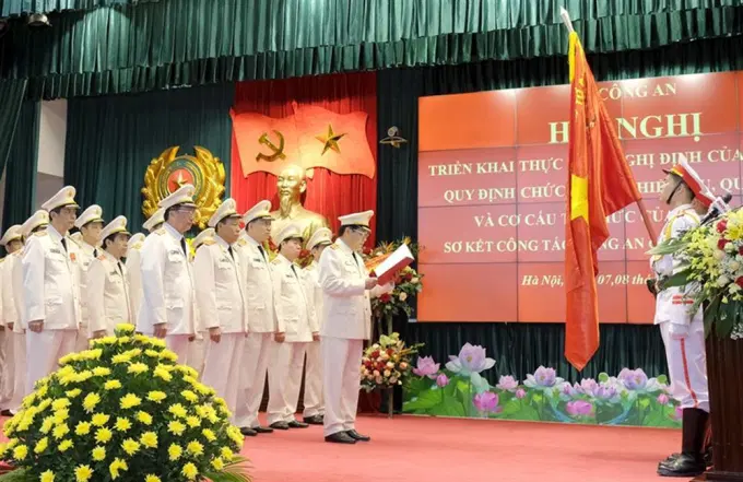 Lễ Tuyên thệ dưới cờ Tổ quốc tại Hội nghị triển khai Nghị định số 01/2018/NĐ-CP của Chính phủ quy định chức năng, nhiệm vụ, quyền hạn và tổ chức bộ máy Bộ Công an (ngày 07/08/2018).